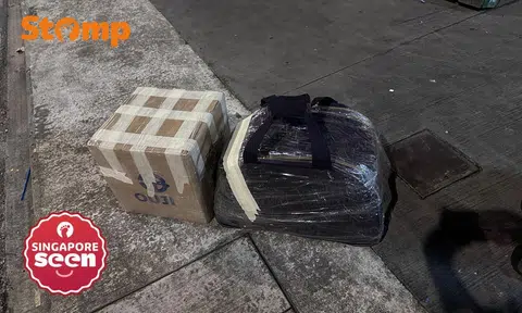 gojek driver cancels ride after seeing woman's duffel bag and box