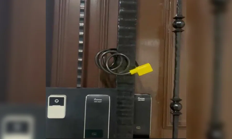 Man, 26, arrested for loan shark harassment after bicycle lock found fastened around Sembawang unit gate