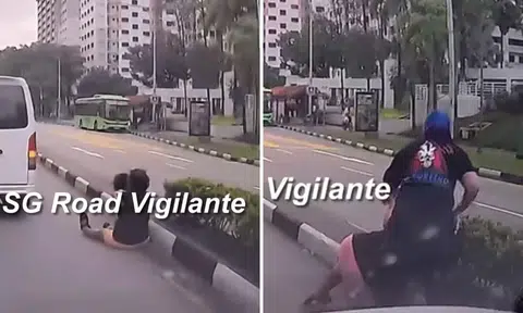Elderly woman carrying toddler falls while jaywalking in Hougang, narrowly avoids getting hit by van