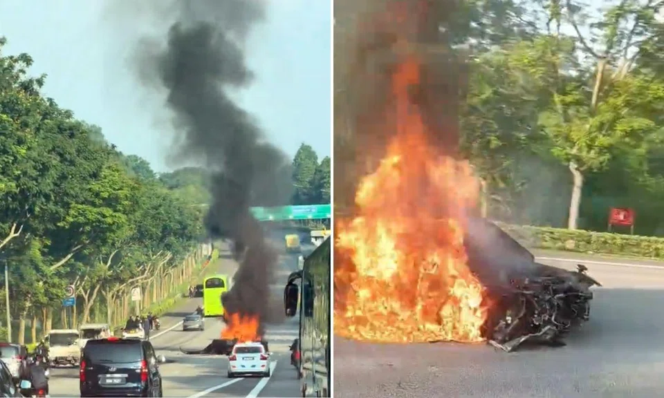 Car in flames on the road