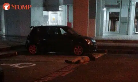 Man lies down in the middle of Jurong West carpark -- at 5.30am