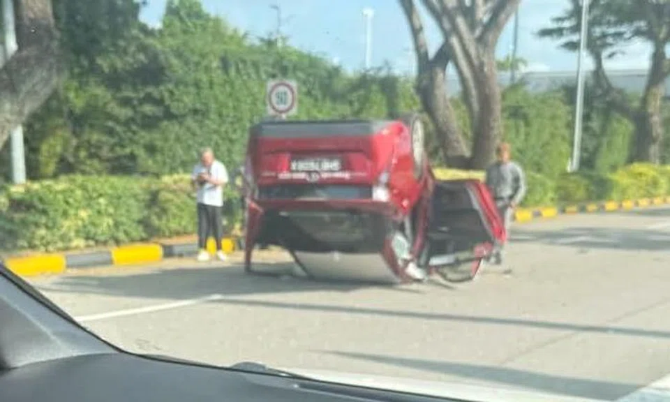 Cabby, 65, and passenger, 47, taken to hospital after taxi turns turtle near airport