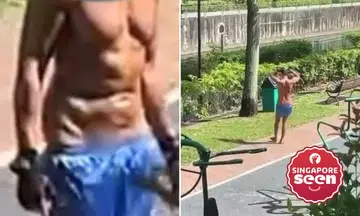 Man exercising at a fitness corner beside the Jurong River at Corporation Rise