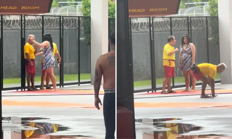 The woman was seen removing the lifeguard's glasses and throwing them on the ground.