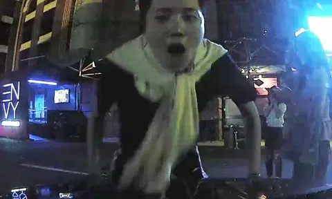 Another person leaps onto car at St James -- and this one even lies on bonnet