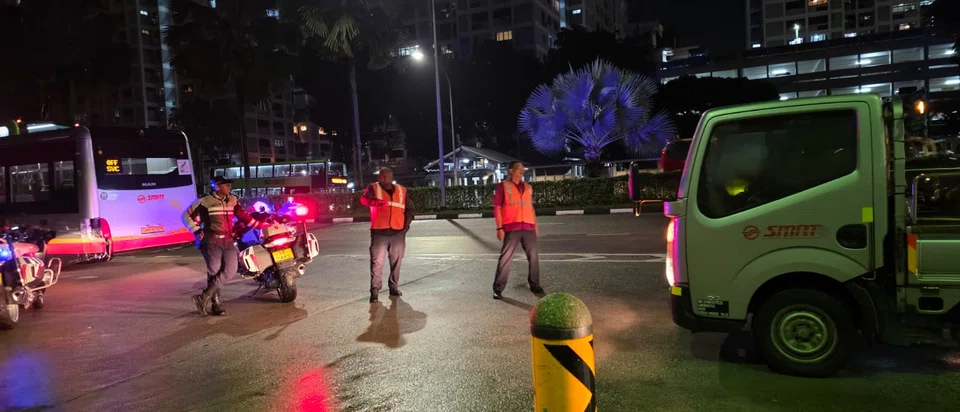 Traffic Police were at the scene with a green SMRT recovery vehicle arriving later.