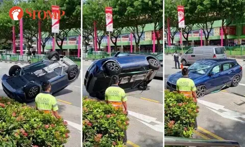 Upside-down BMW turned right side up in Chinatown