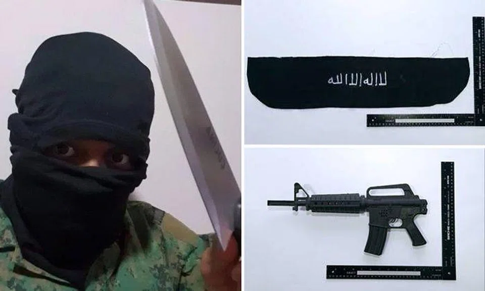 Muhammad Irfan Danyal Mohamad Nor had planned to demonstrate his support for ISIS by filming a video of himself taking the ba’iah (pledge of allegiance) while wearing his National Cadet Corps uniform, a self-made ISIS flag and headband, and carrying a toy rifle. PHOTOS: INTERNAL SECURITY DEPARTMENT