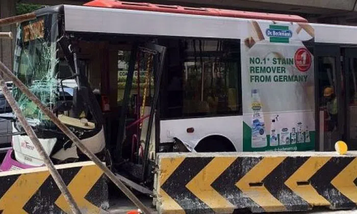 2 passengers suffer bruises and cuts after bus crashes into road ...