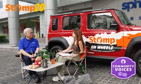 Chan Yeng Kit and Juliana Yeow in front of a Suzuki Jimny