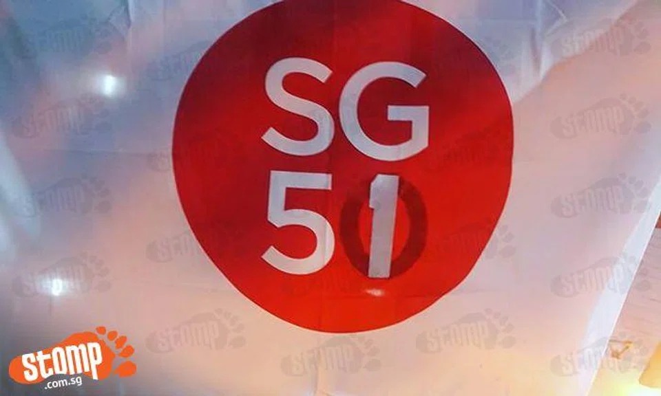 Like that also can? Banner repainted to change SG50 to SG51 at Yishun block