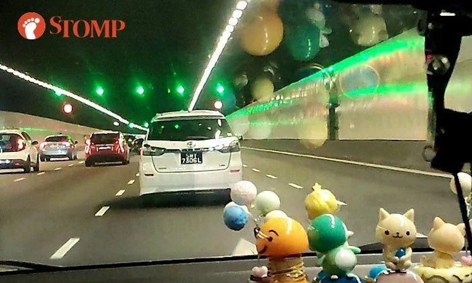 The Stomper shared a video of the white Toyota in front of their car in the KPE tunnel.