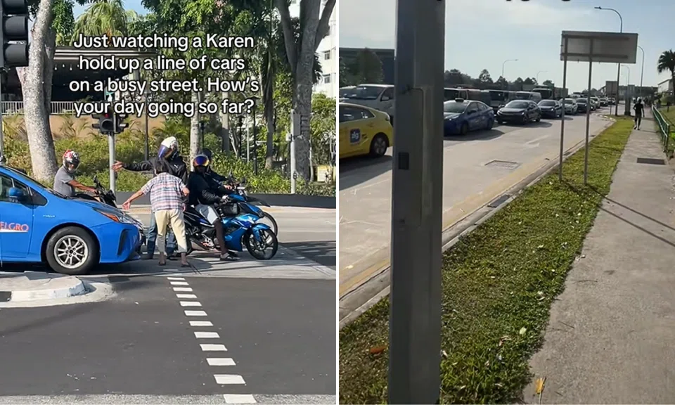 A woman was spotted holding up a line of cars during a dispute.