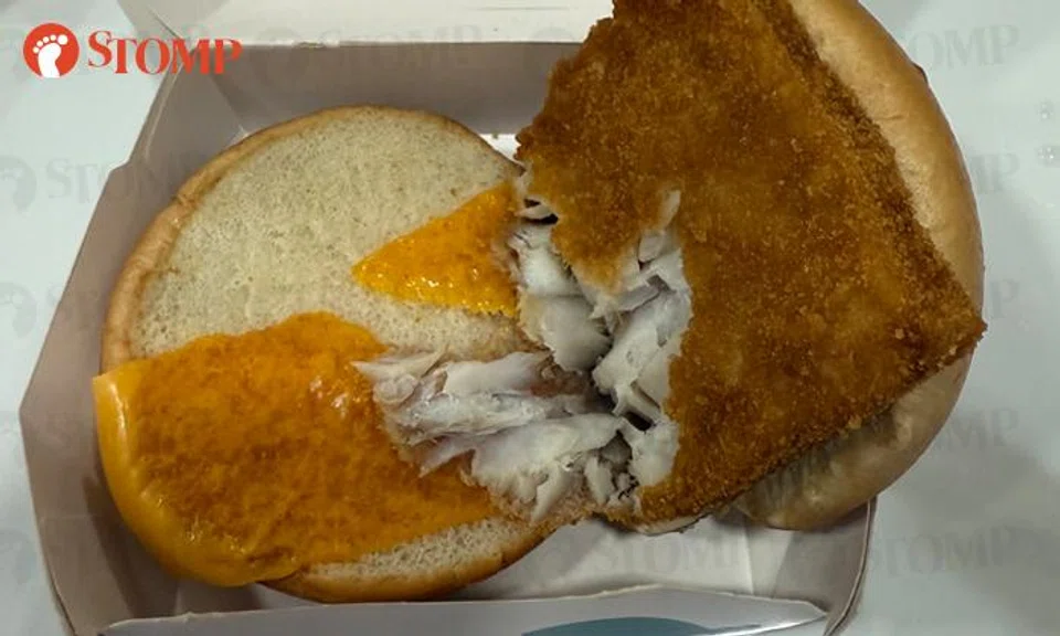 For the umpteenth time, McDonald's Filet-O-Fish burger comes with half a slice of cheese