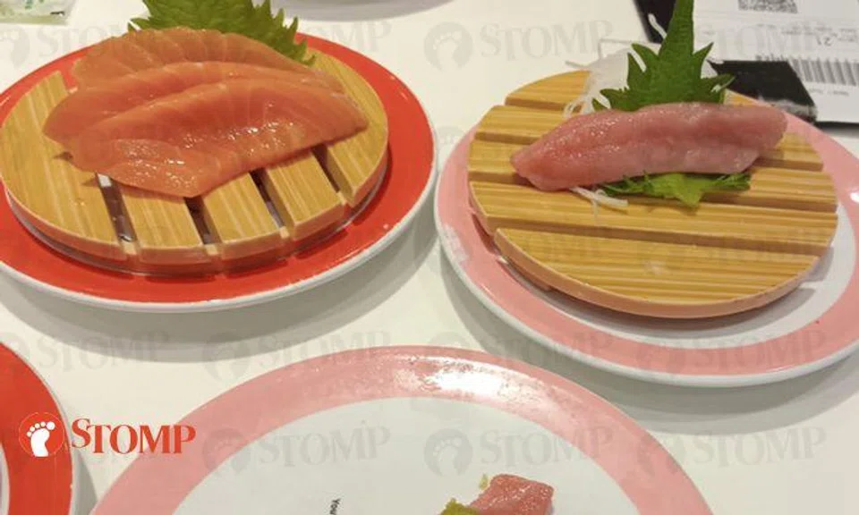 Genki Sushi diner's meal soured by sashimi that looks 'so weird' and server who 'banged cup' on table
