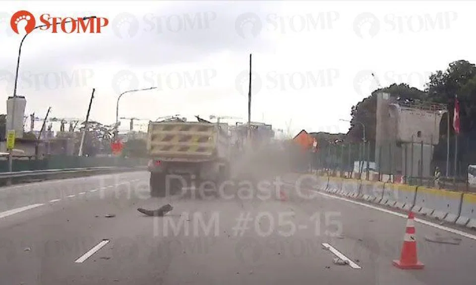 Truck tyre 'explodes' on PIE, stuns workers and motorists