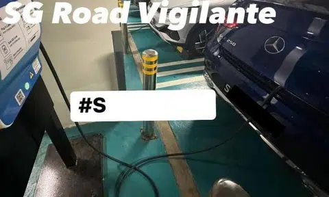 A photo posted online by SG Road Vigilante shows a dark blue Mercedes-Benz GLC250 SE Coupe, a petrol-powered vehicle, parked in front of the SPgroup charging station on June 22 at 7pm.