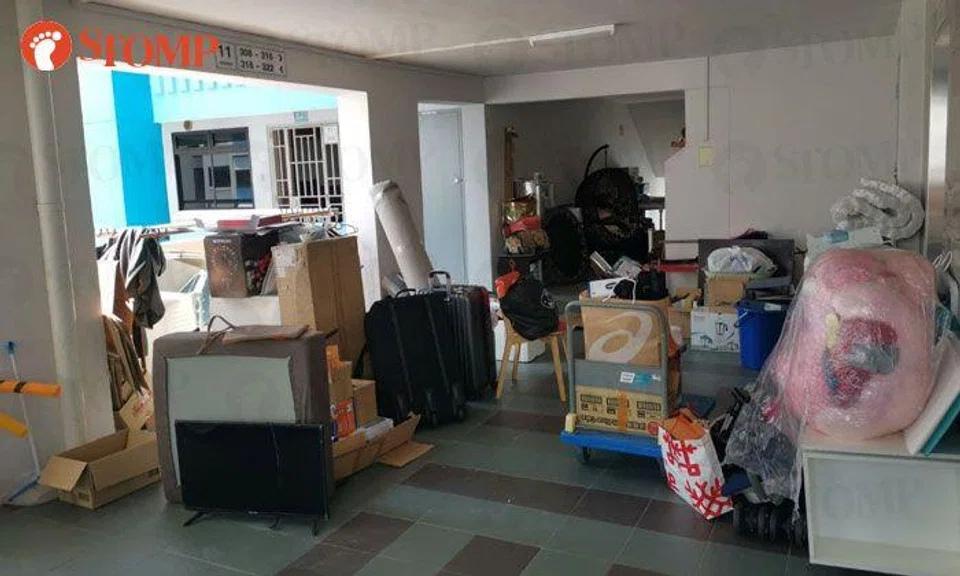 Sengkang resident fills common corridor and lift lobby with personal items, neighbours at a loss