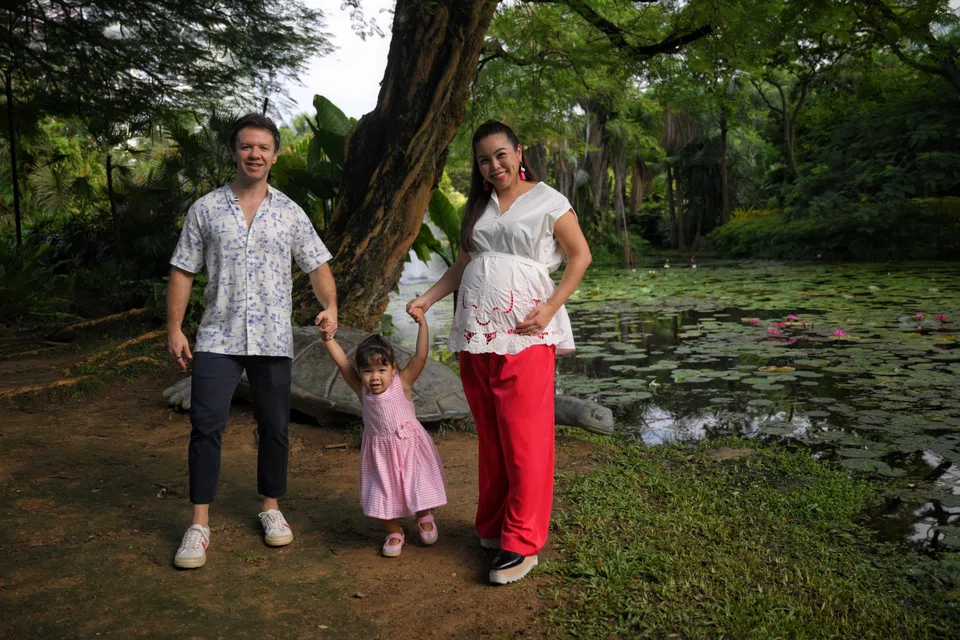 Former Kiss92 DJ Charmaine Yee, her husband Camilo Paredes and their daughter Mila.