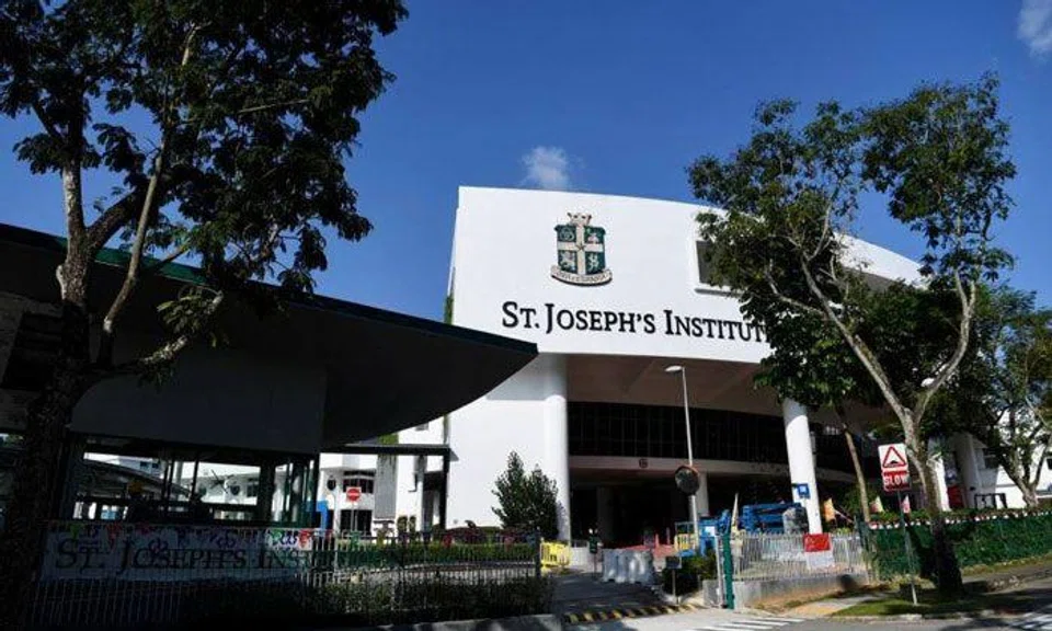 The student was conscious when he was taken to the hospital. ST PHOTO: DESMOND FOO