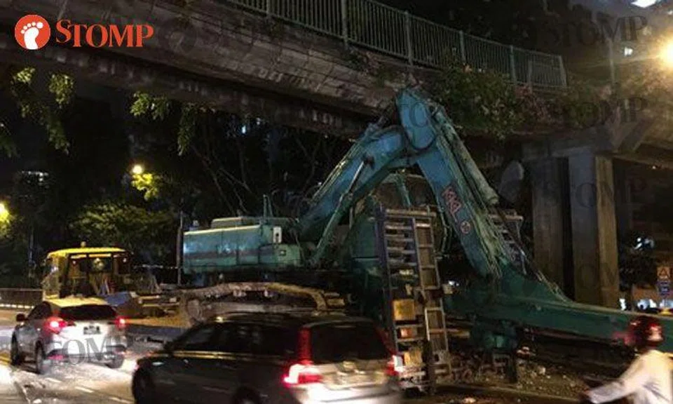 2 arrested after excavator arm crashes into overhead bridge along Balestier Road