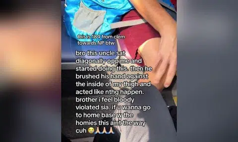 In his video, a person can be seen sitting close to Maxwell with their knees almost touching each other. 