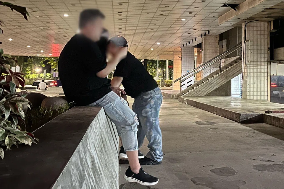 A vape user near Drip, a nightclub along Kramat Lane, on July 17.