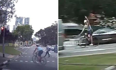 Cyclist runs red light at pedestrian crossing, gives motorist the finger after being honked at in Tanglin