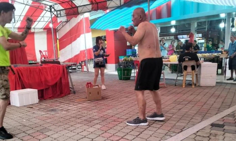 Man takes off shirt to fight another in Ang Mo Kio purportedly over woman, both arrested for affray