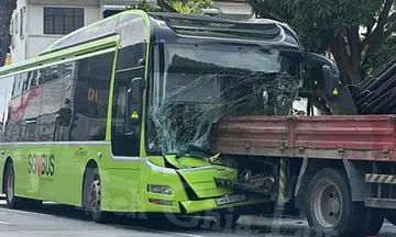 Bus driver, 74, trapped after crashing into lorry on Upper East Coast Road