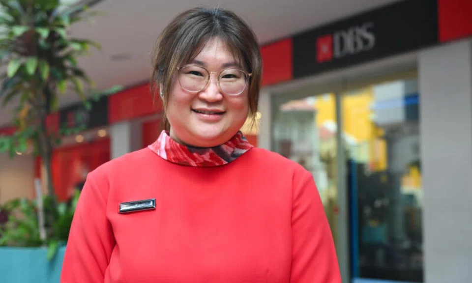 Ms Karen Teo, a bank officer at DBS' South Bridge Road branch