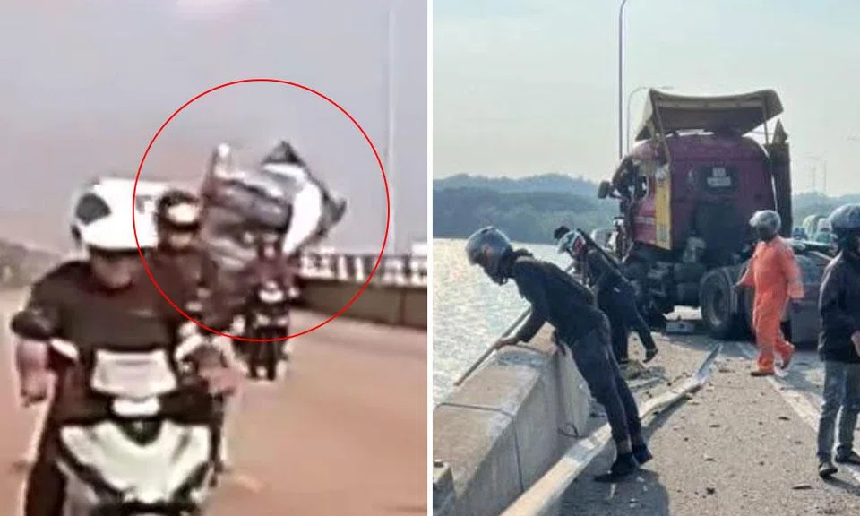 chemical tank falls into see off second link tuas after trailer collision