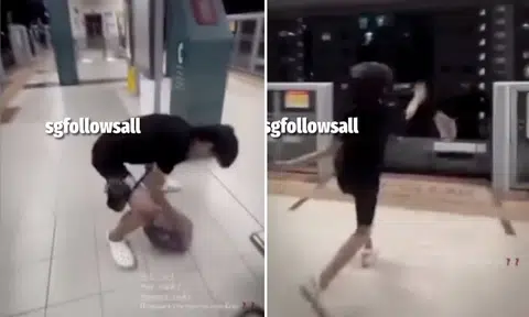 boy hurls plastic bag off cove lrt platform