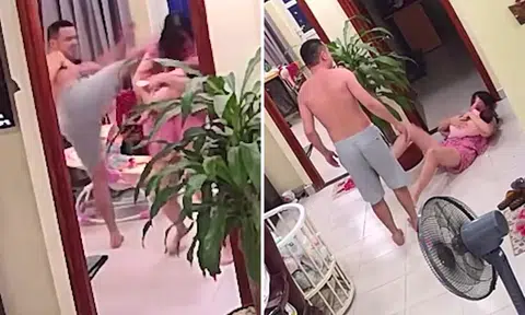 Vietnamese martial arts teacher beats up wife for moving his TV -- while she's holding baby