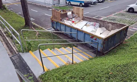 skip bin blocks hdb stairs, residents complain
