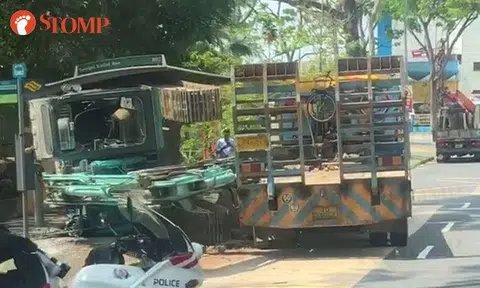 Excavator falls from prime mover at Sungei Kadut bus stop, driver assisting with police investigations