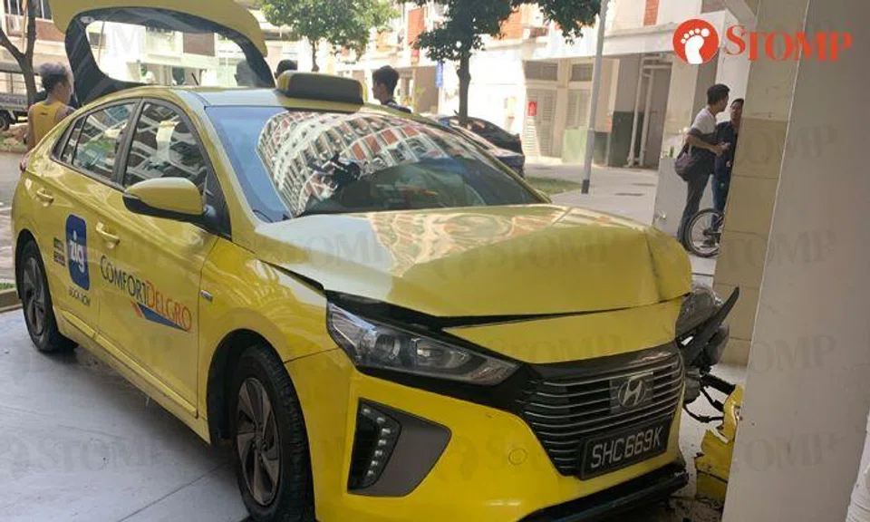 Cabby assisting with police investigations after crashing into Hougang void deck