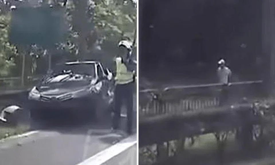 In a video uploaded on Facebook on June 21, a man (right) can be seen running against traffic along the road shoulder of the SLE.