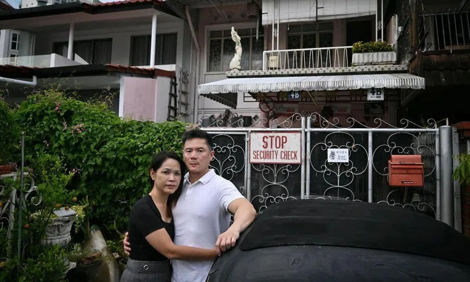 The victim, Mr Elgar Kwek, and his partner, Ms Brenda Chow, at the landed property in Katong that Mr Kwek owns.