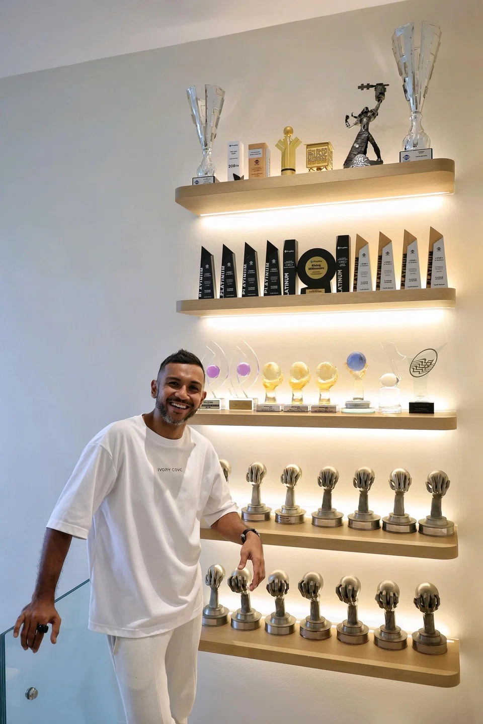 The display area for Taufik Batisah's awards in his new three-storey landed property. ST PHOTO: KEVIN LIM