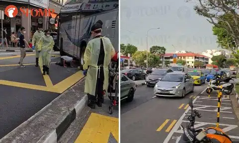 Bus mounts road divider and causes heavy jam along East Coast Road