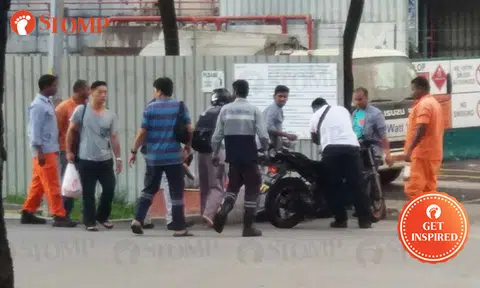 Kind souls rush to help female biker who fell after hitting car along Tanjong Kling Road