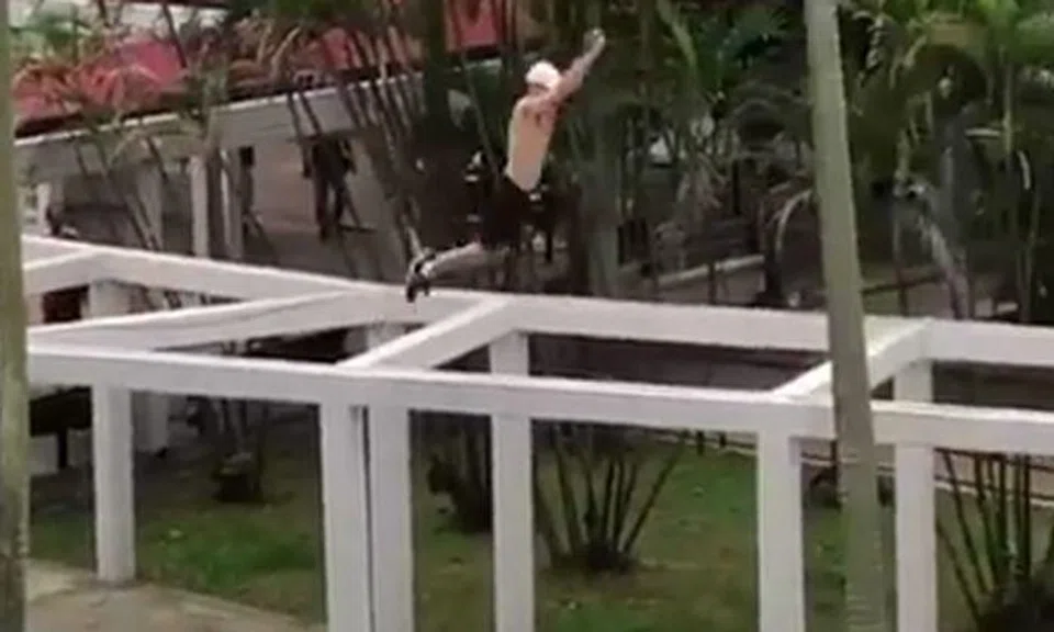 Guy does 'standing broad jump'... on roof of HDB walkway structure