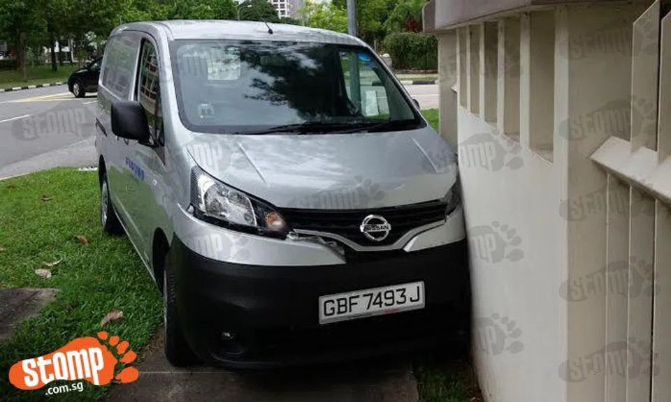 Van driver slams into wall outside condo after allegedly trying to avoid car at Tampines St 73