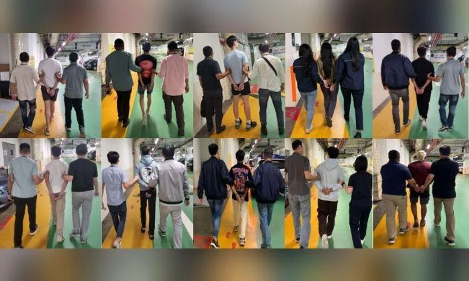 A total of 11 men and one woman, aged between 17 and 40, were arrested for their suspected involvement in the recent spate of banking-related malware scam cases. Photos: Singapore Police Force