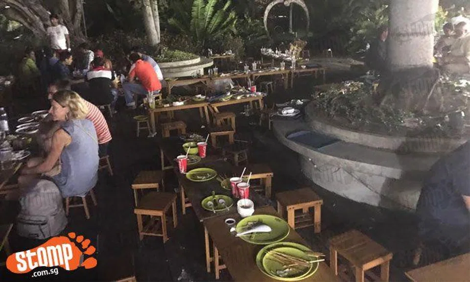 Diner put off by rows of uncleared tables and unlit premises at Satay by the Bay