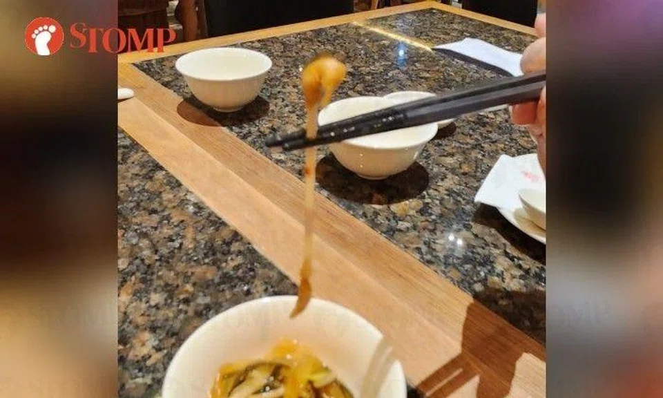 A Din Tai Fung customer found a cotton bud in a plate of Oriental Salad in Special Vinegar Dressing at the Suntec City outlet on March 2.