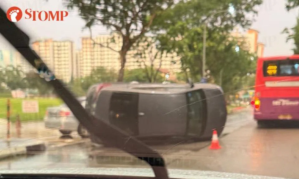 car tipped on its side