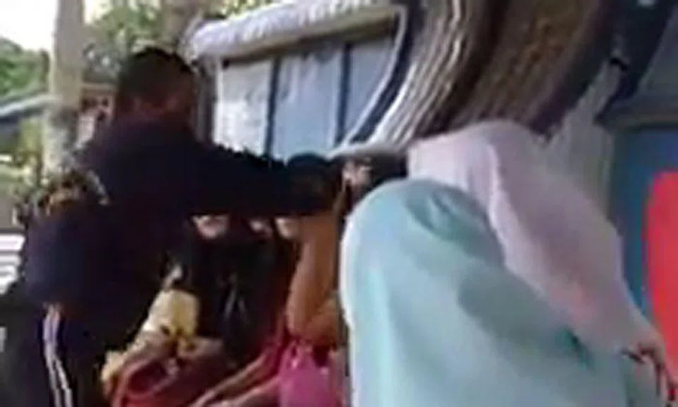 Malaysian man slaps woman allegedly for not wearing headscarf, video goes viral