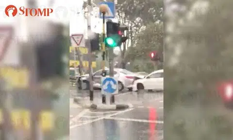 Silver Cab taxi crashes into road sign, car rams into its back along Ayer Rajah Ave